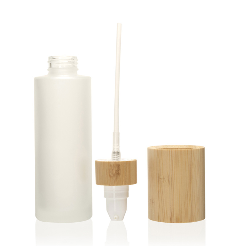 つや消し化粧品ローション ポンプ細かいミストと竹木の蓋が付いているローションのガラス スプレー ボトル つや消し化粧品ローション ポンプ細かいミストと竹木の蓋が付いているローションのガラス スプレー ボトル