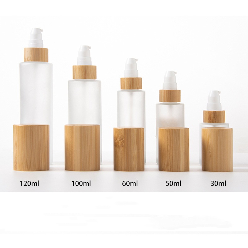 つや消し化粧品ローション ポンプ細かいミストと竹木の蓋が付いているローションのガラス スプレー ボトル つや消し化粧品ローション ポンプ細かいミストと竹木の蓋が付いているローションのガラス スプレー ボトル