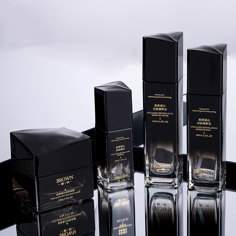 化粧品の包装のための上げられた蓋の設計が付いているユニークな正方形のガラスのクリーム瓶 化粧品の包装のための上げられた蓋の設計が付いているユニークな正方形のガラスのクリーム瓶