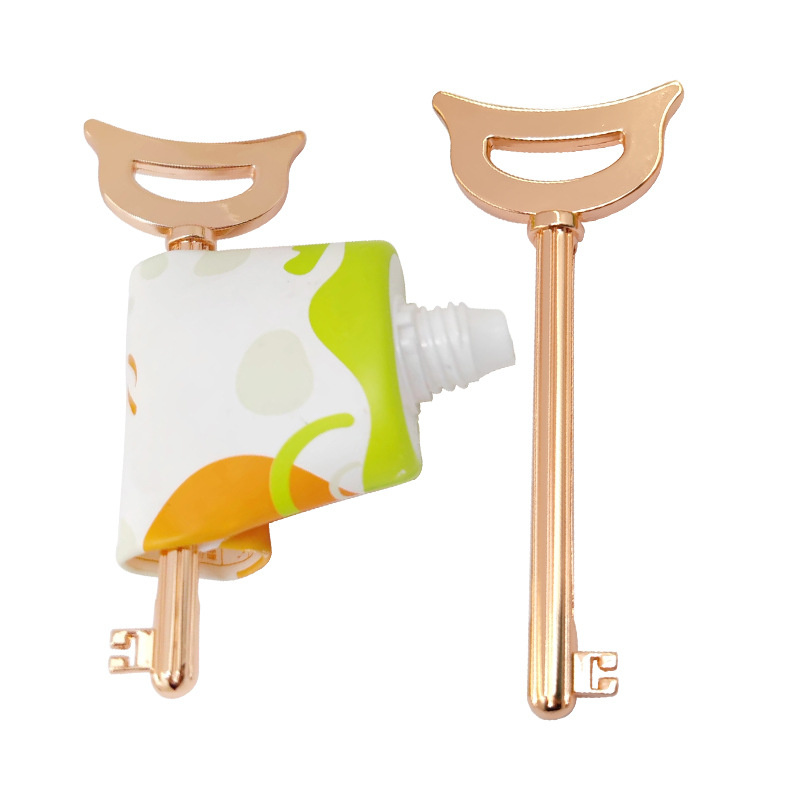 歯磨き粉化粧品クリームカラーパック用のキー型亜鉛合金チューブスクイーザーのユニークなデザイン 歯磨き粉化粧品クリームカラーパック用のキー型亜鉛合金チューブスクイーザーのユニークなデザイン